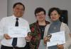 2017 AATA President Tatjana Marx present AATA Certificates of Appreciation for Jury to Zhang Xinhua (left